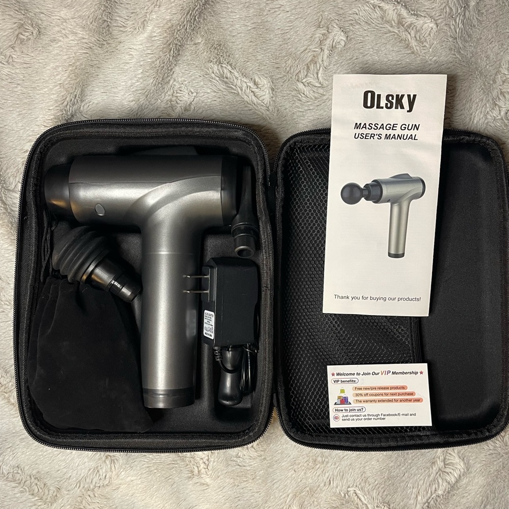 Handheld deep tissue Massage Gun great condition with multiple attachments